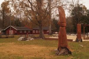 Red barn and carvings